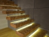 Stair lights linear LED lights on floating staircase close up